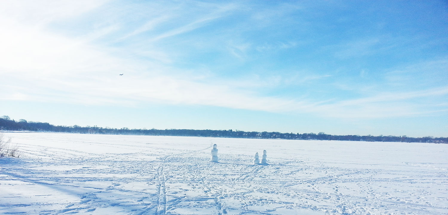 Snow men on Minneapolis's Lake Calhoun