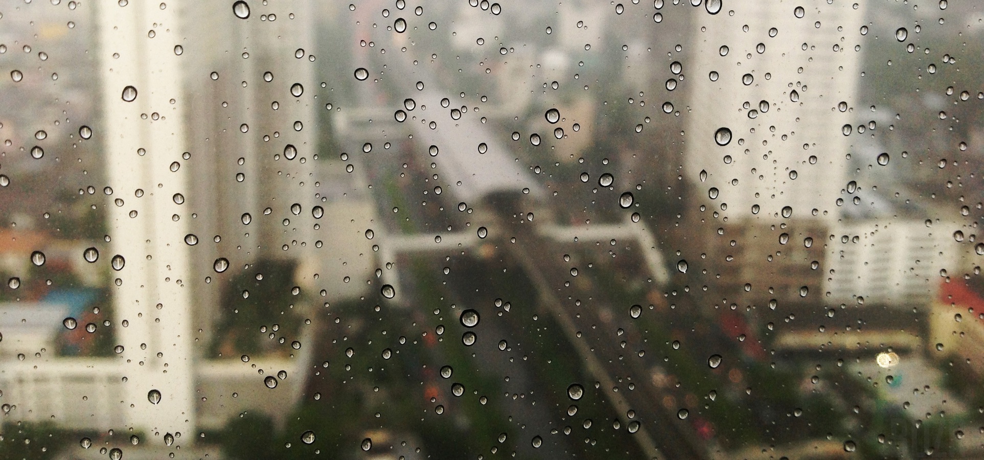 Rain on a window by Thanun Buranapong via Unsplash