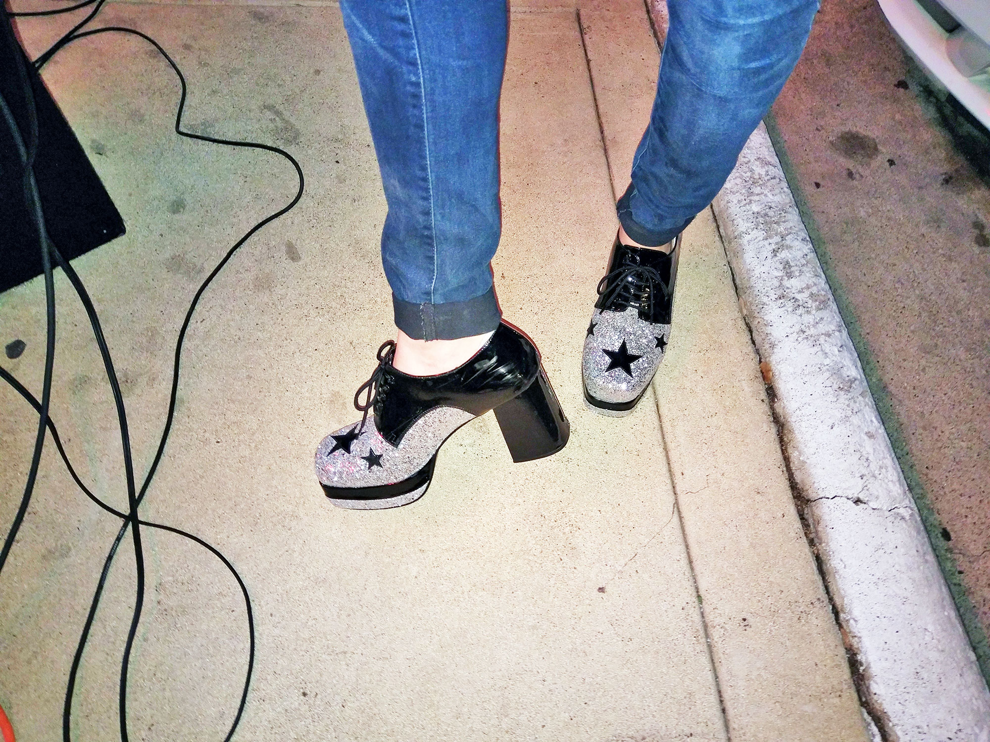 The street dancer's platform shoes.