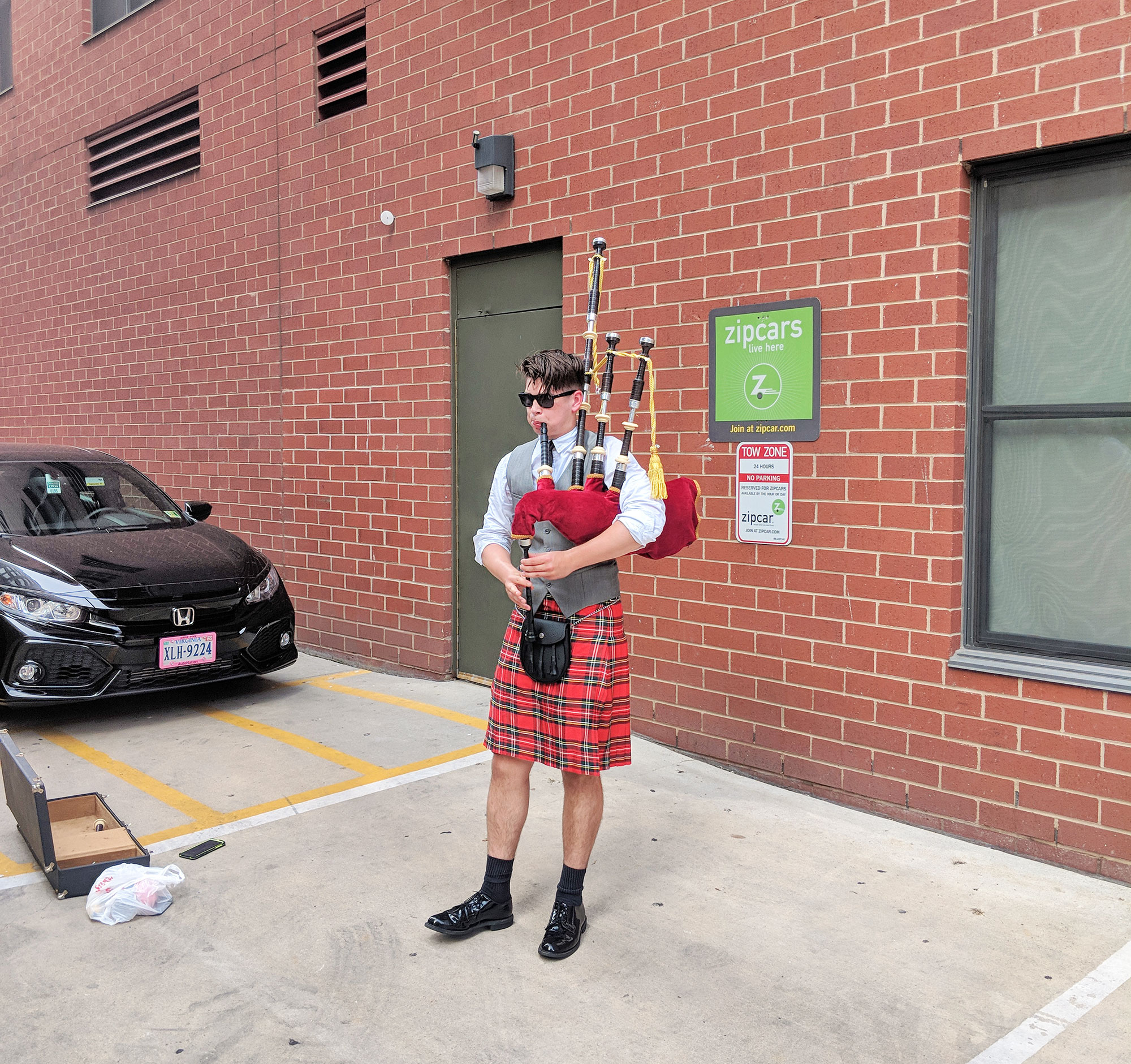 A random bagpipe player on July 4th in Chinatown.