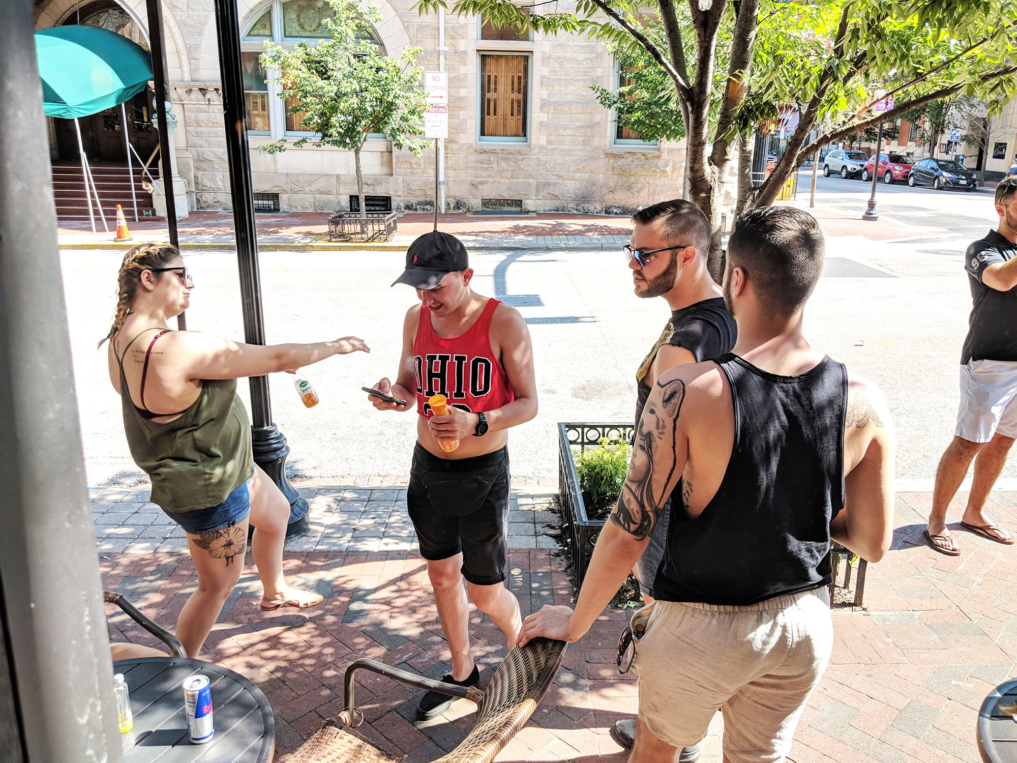 People dancing outside of Grand Central gay bar in Baltimore. 