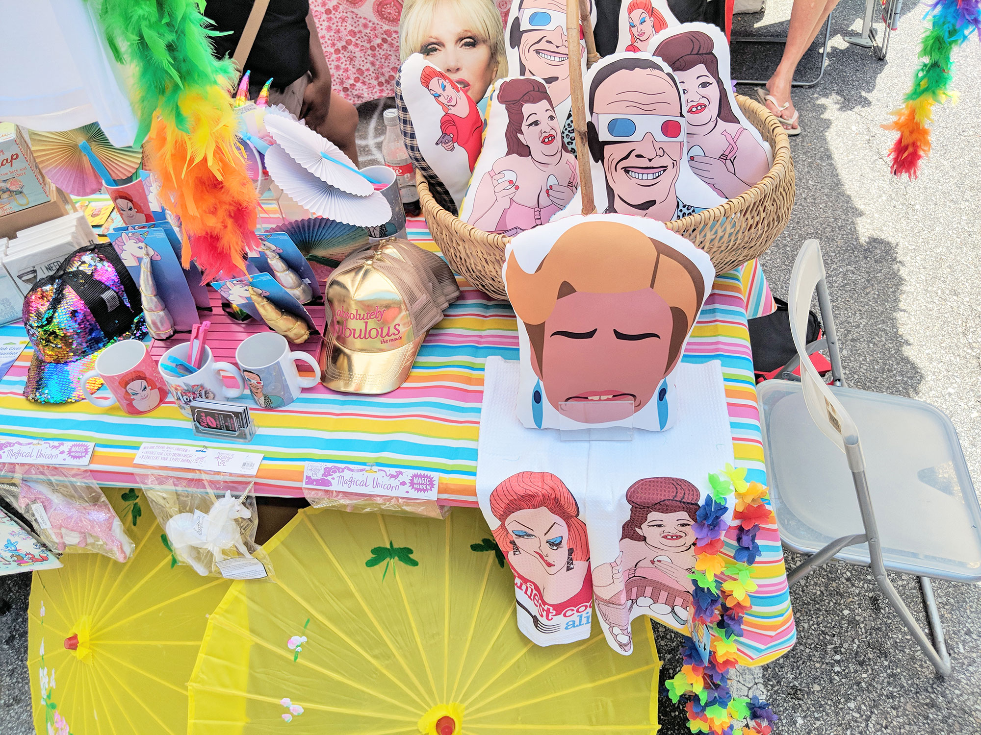 Gay novelty items at a Baltimore gay pride festival booth. I love the Strangers with Candy pillow!