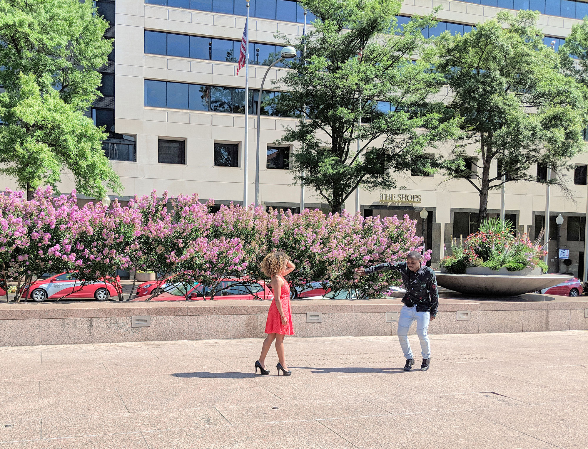 A couple dancing on Freedom Plaza in Washington D.C.