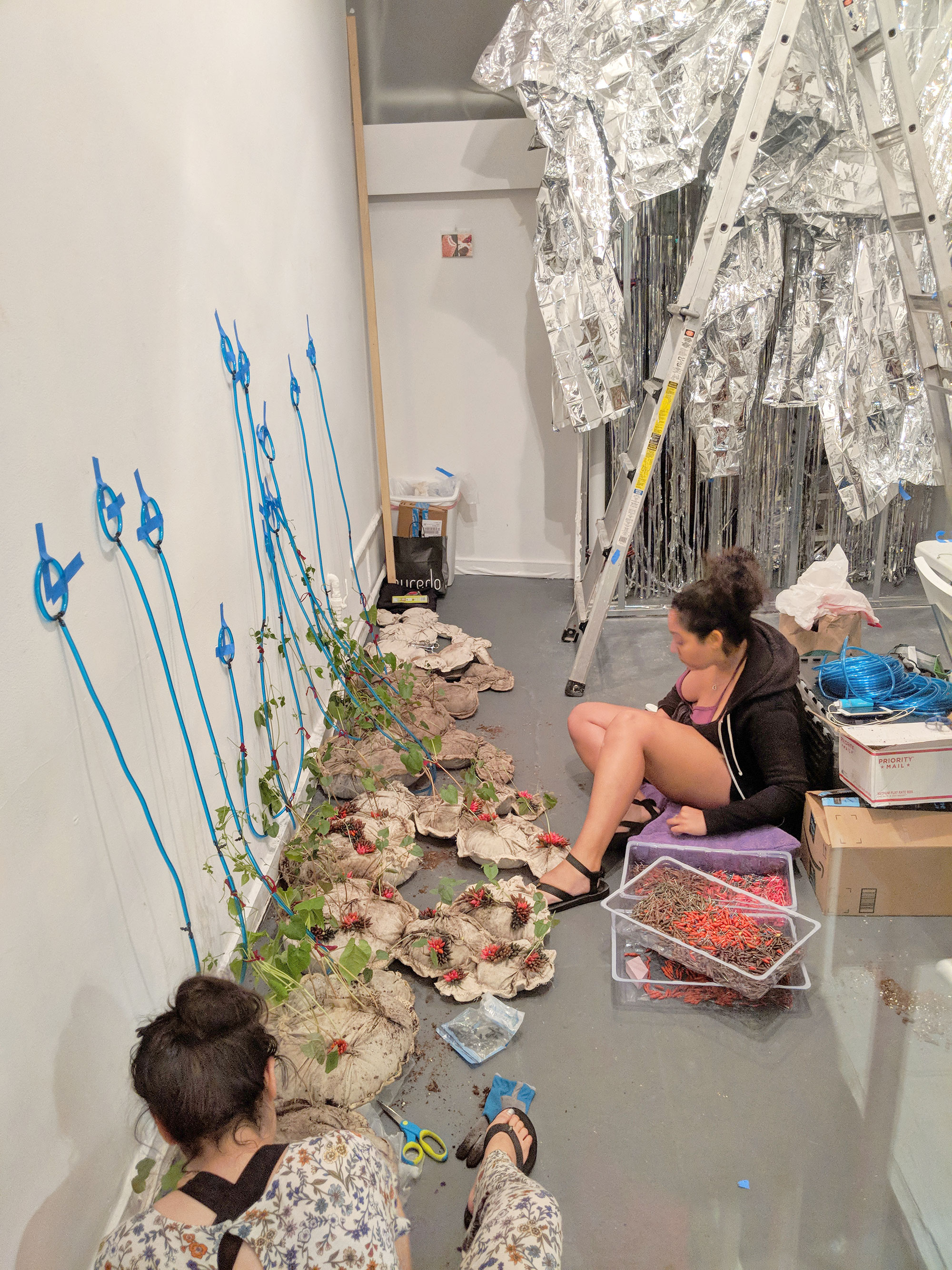 Women working on an art installation in Logan Circle.