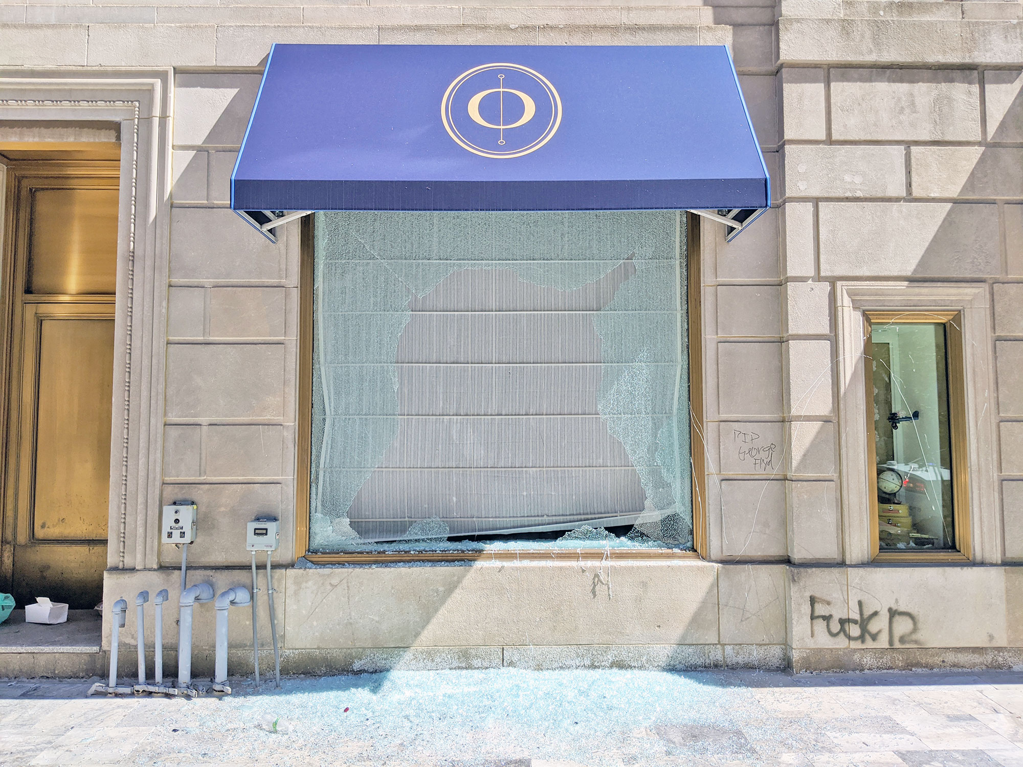 Opaline restaurant with windows destroyed by the George Floyd protest in downtown Washington D.C.