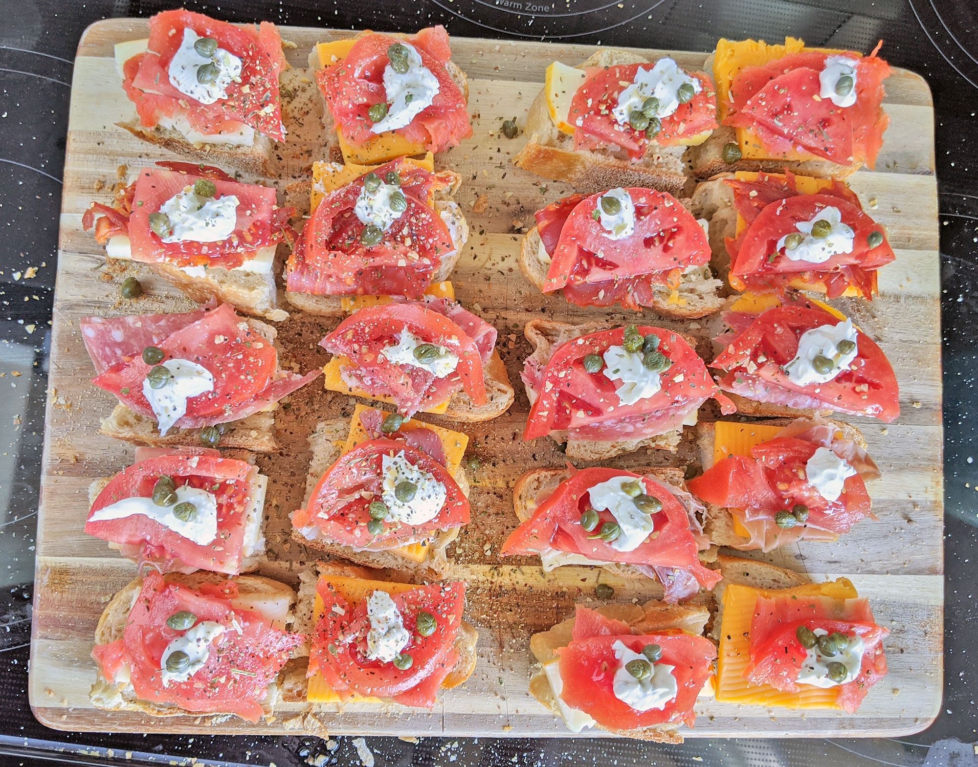 Cold-cuts, sour cream and capers for the breakfast sandwiches.