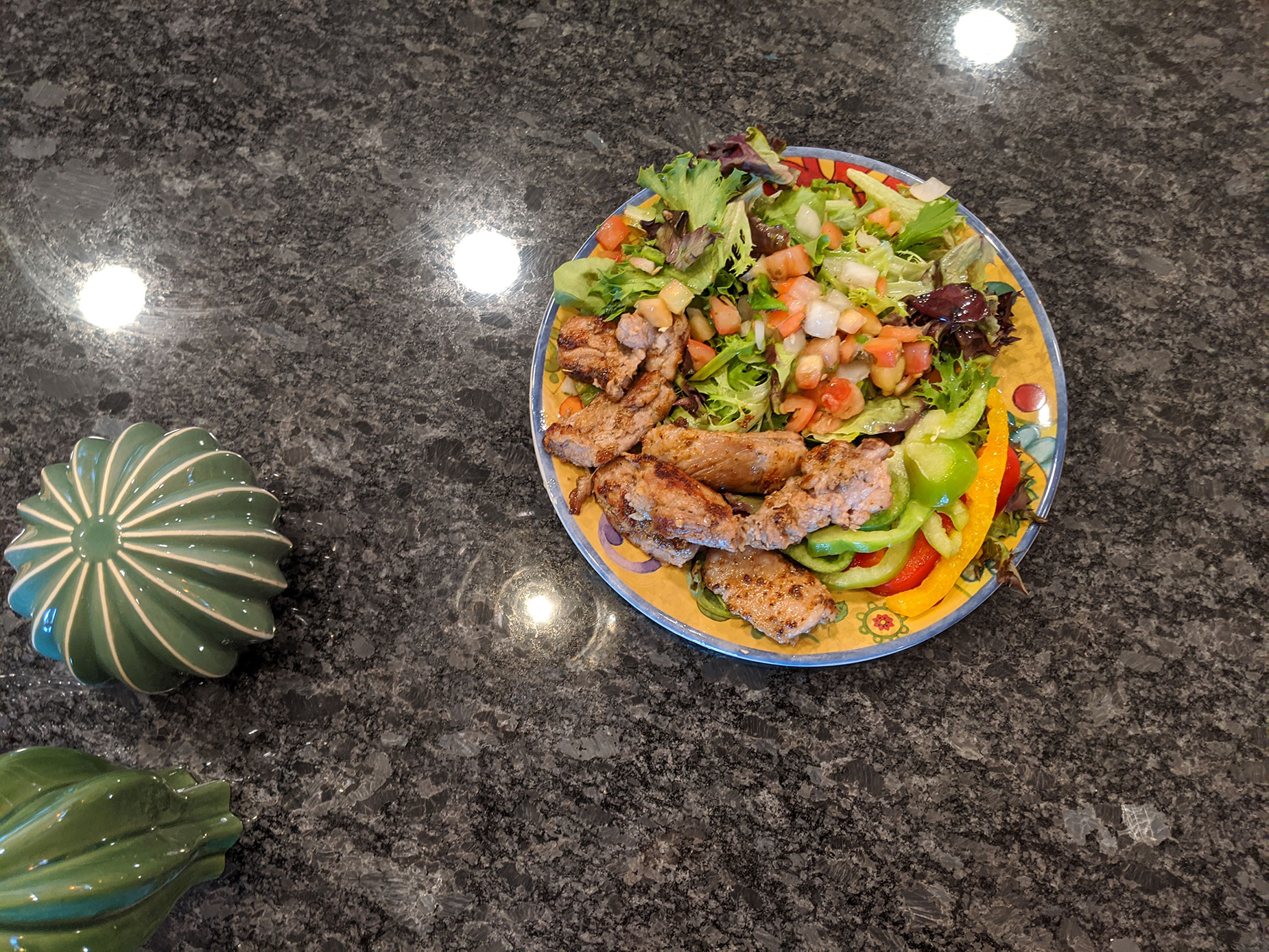 Pork ribs with a side salad for dinner.