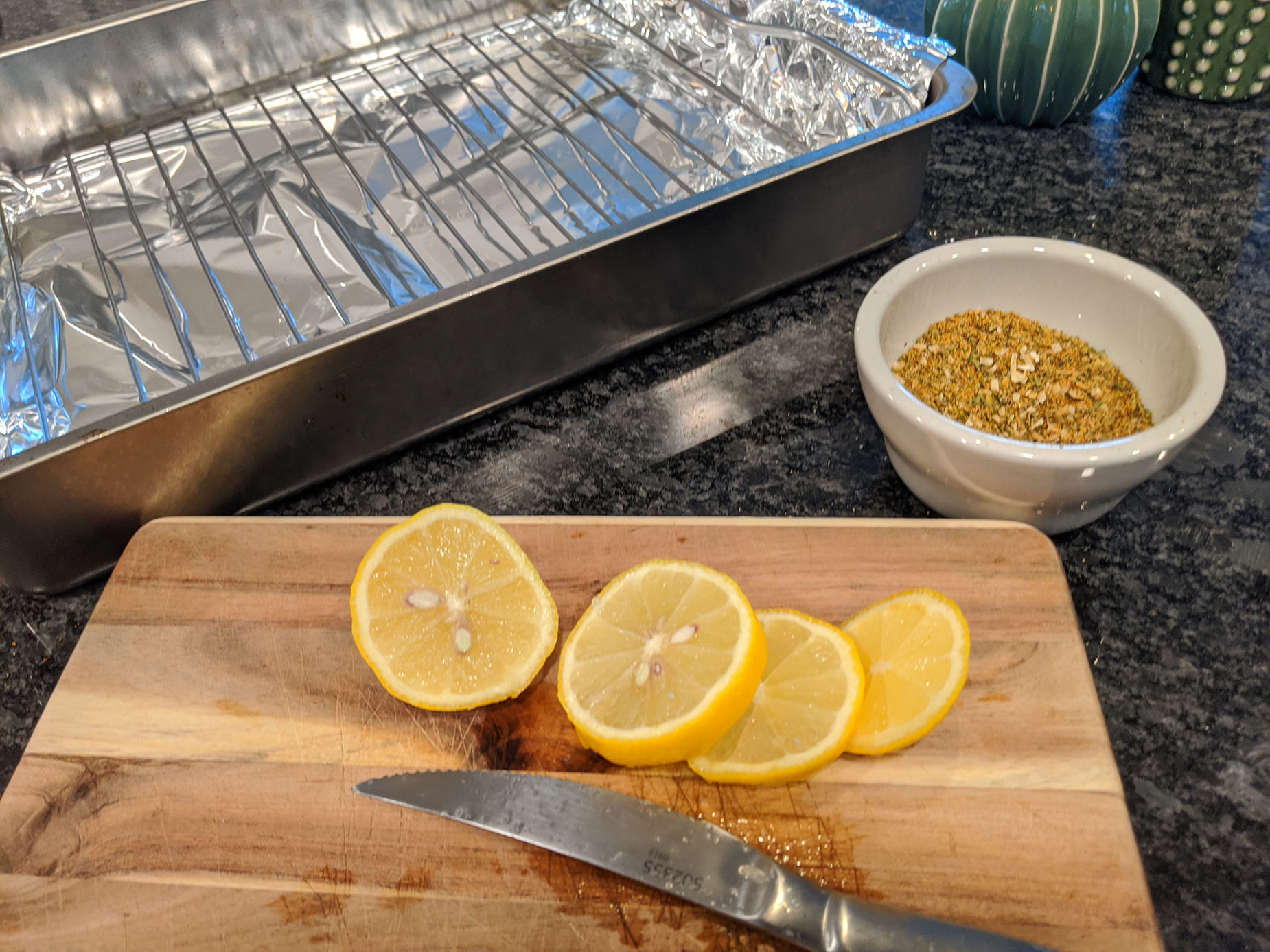 Using the lemons and seasoning for the pork ribs.