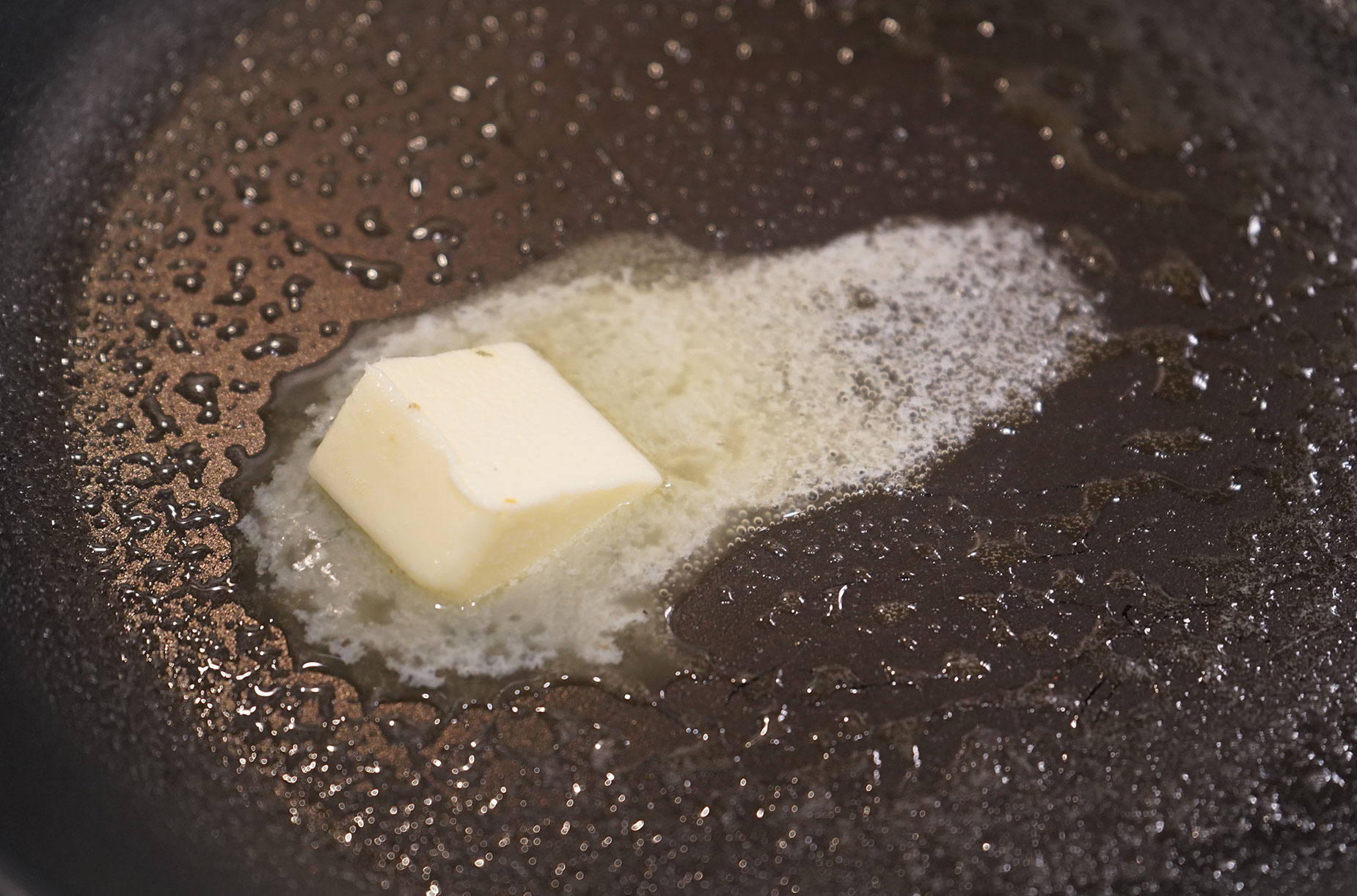 Melting butter for the tortillas.