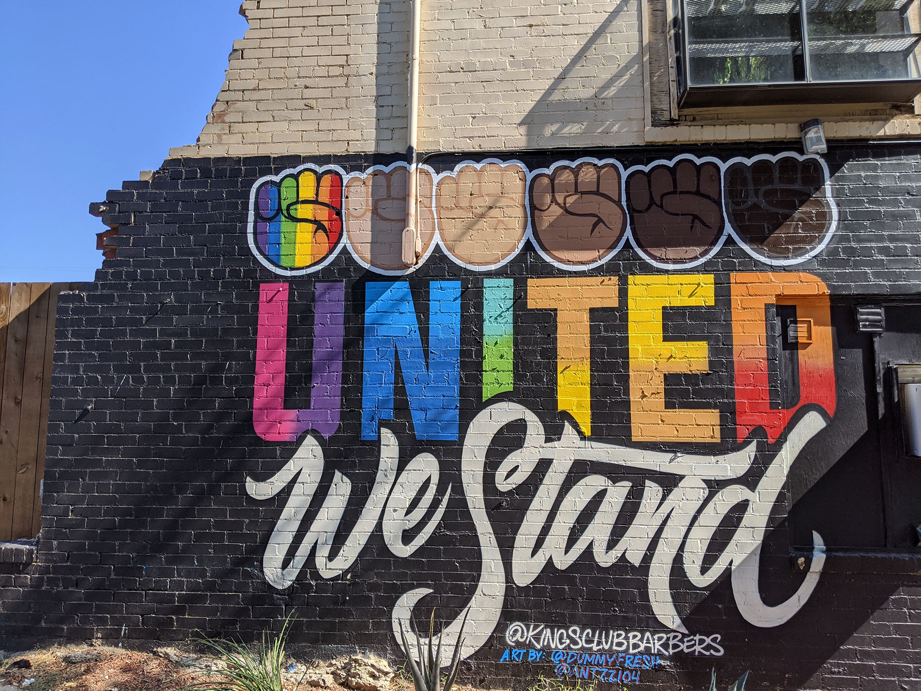 United We Stand Mural at the Kings Club barber shop in Dallas' Bishop Arts District.