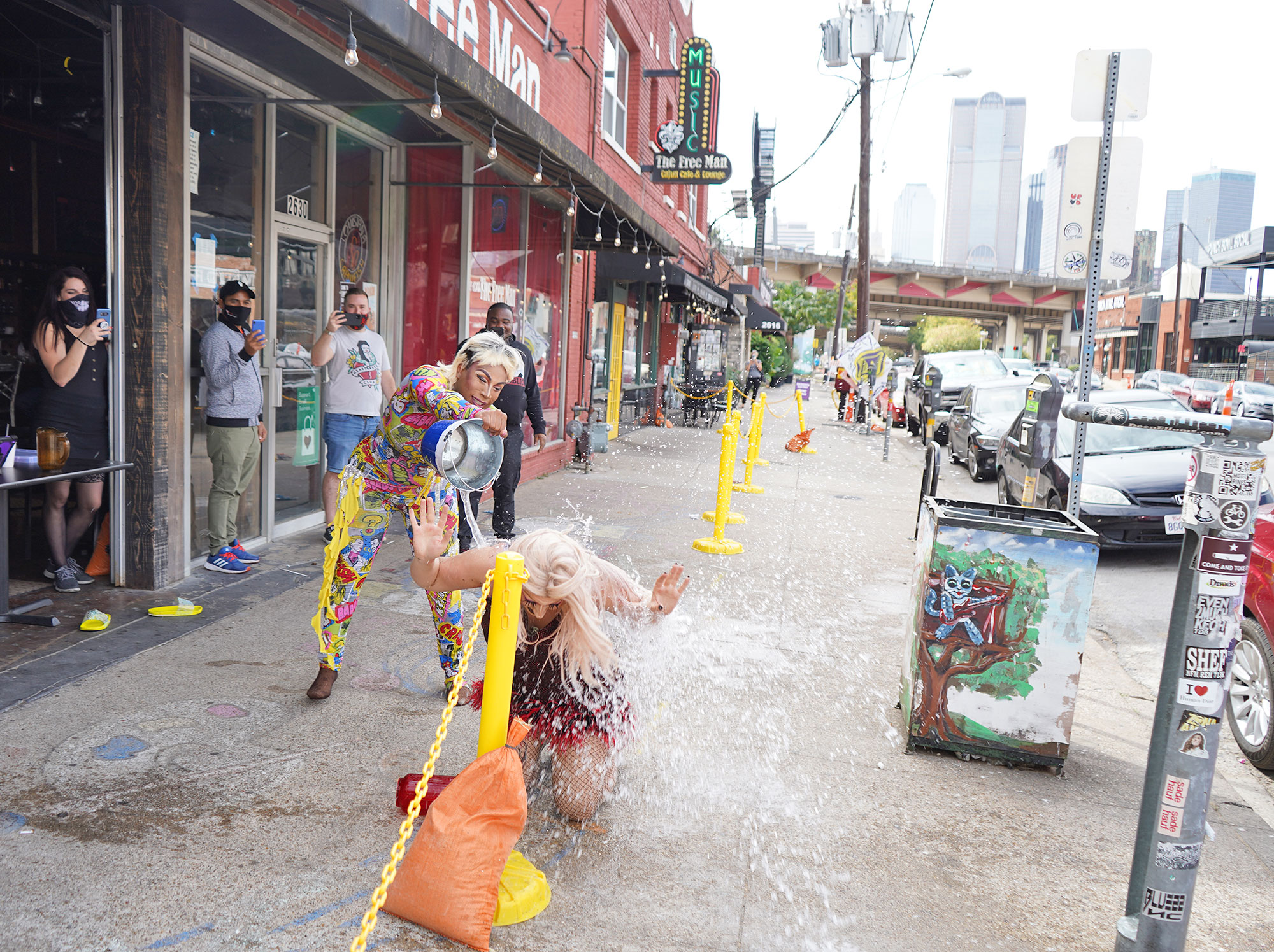 A water fight at Dallas drag brunch.