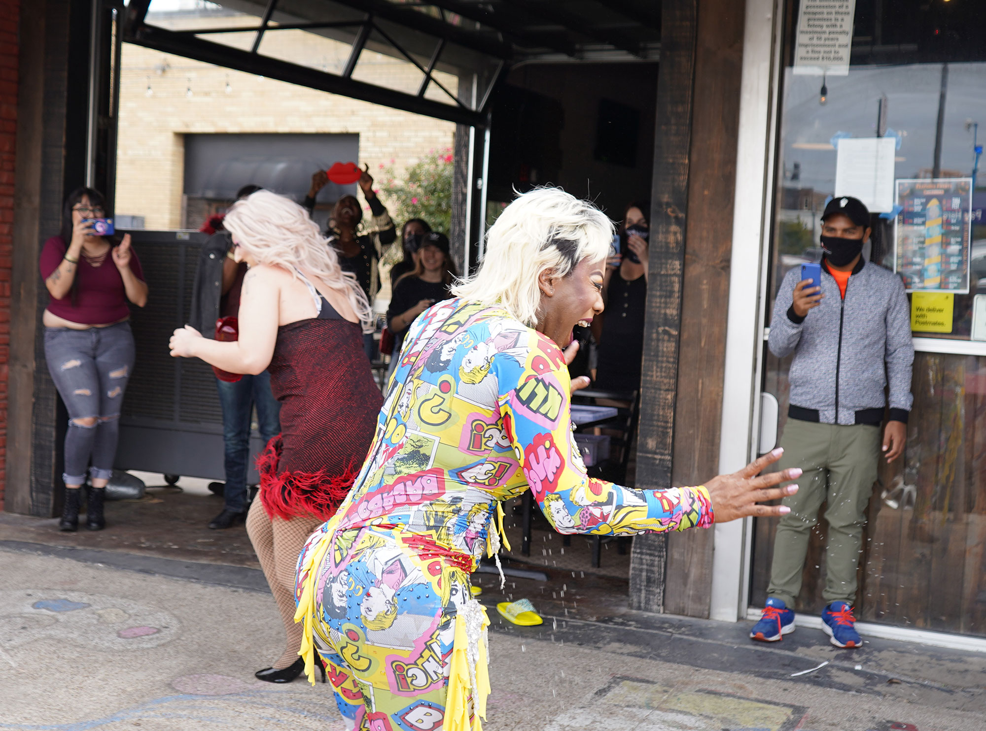 A water fight at Dallas drag brunch at the Free Man.