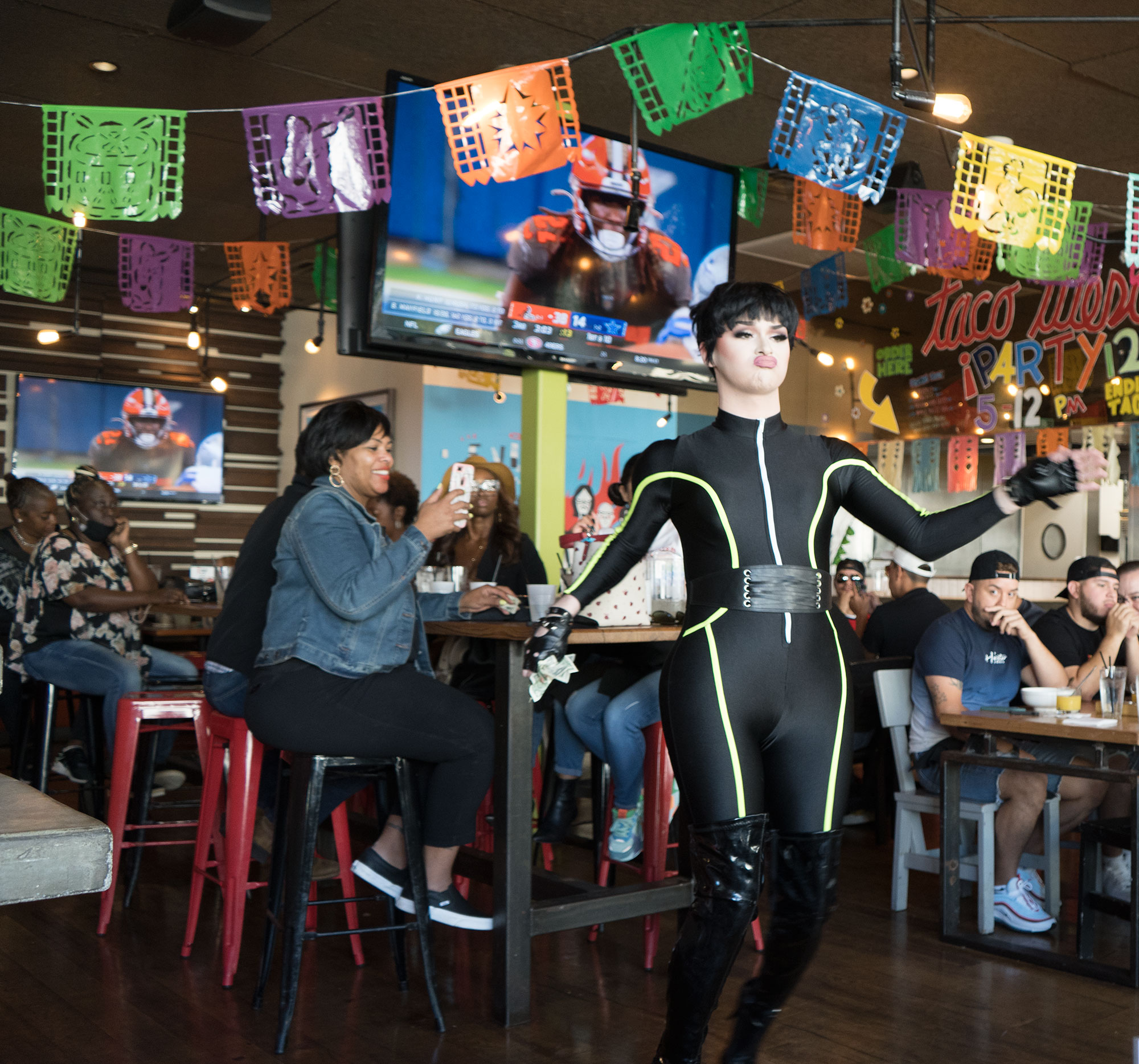 Lady Monroe performing at Tacos and Tequila Drag Brunch in Uptown Dallas.