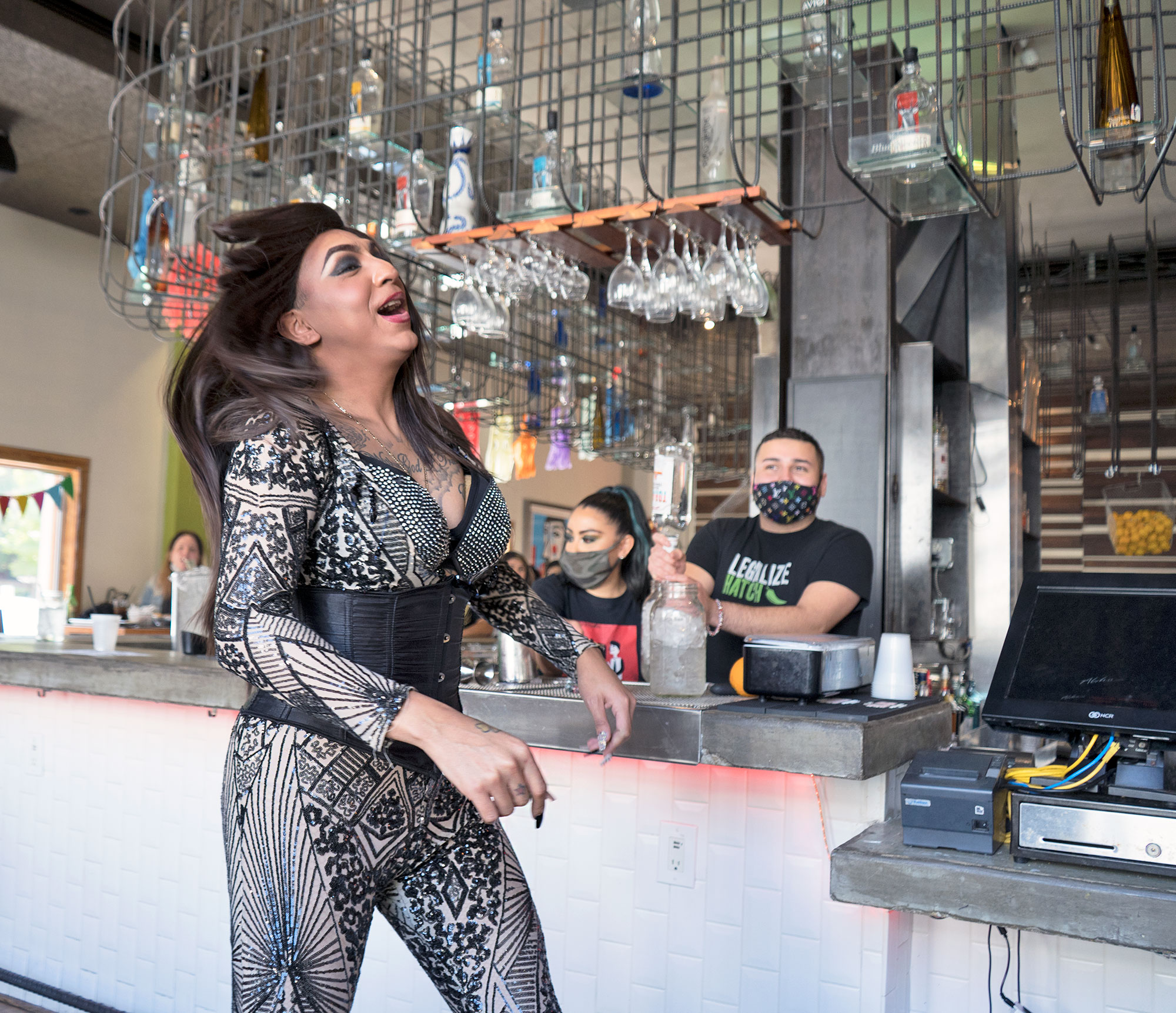 Mayra D'Lorenzo performing at TNT Tacos and Tequila drag brunch in Uptown Dallas.