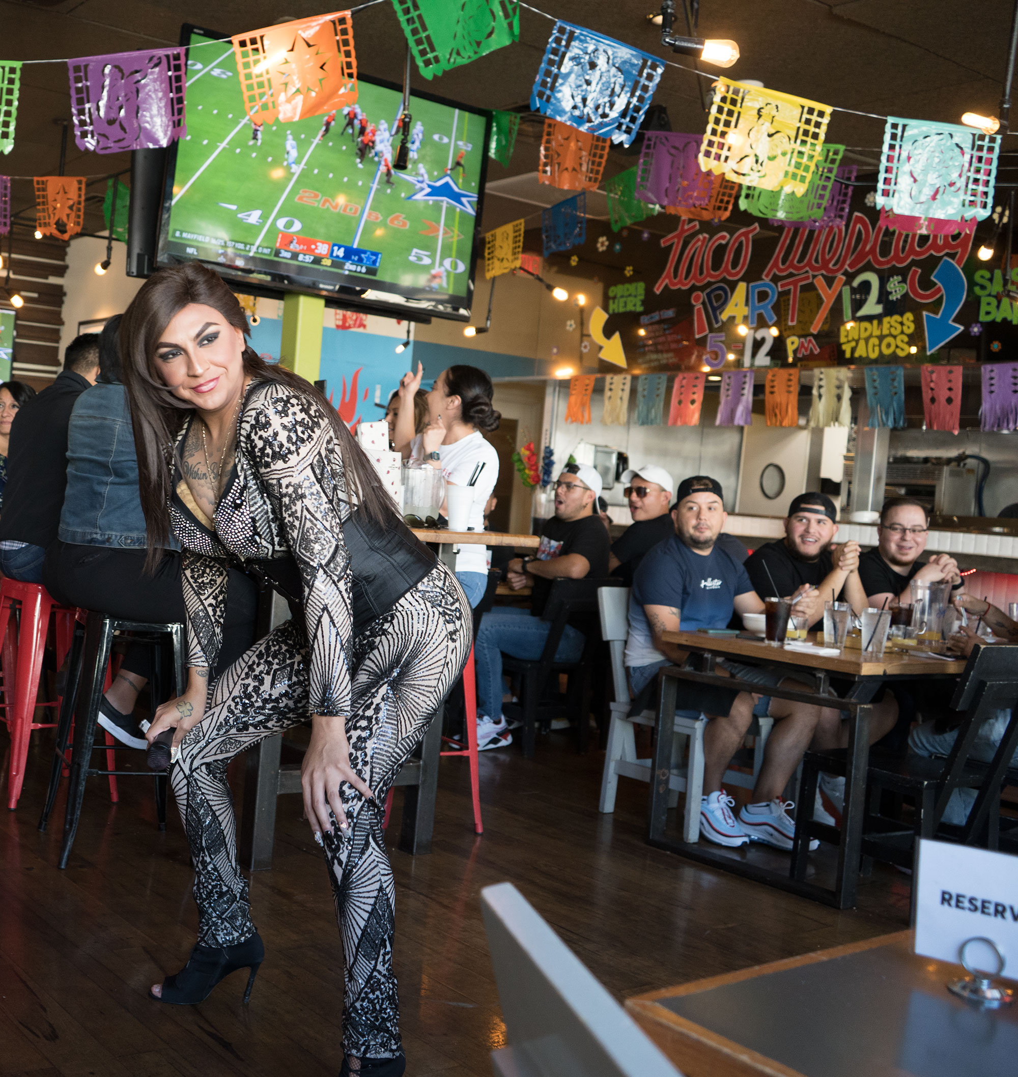 Mayra D'Lorenzo performing at TNT Tacos and Tequila drag brunch in Uptown Dallas.